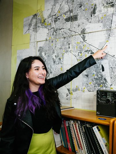A Tilting Futures participant pointing at a map